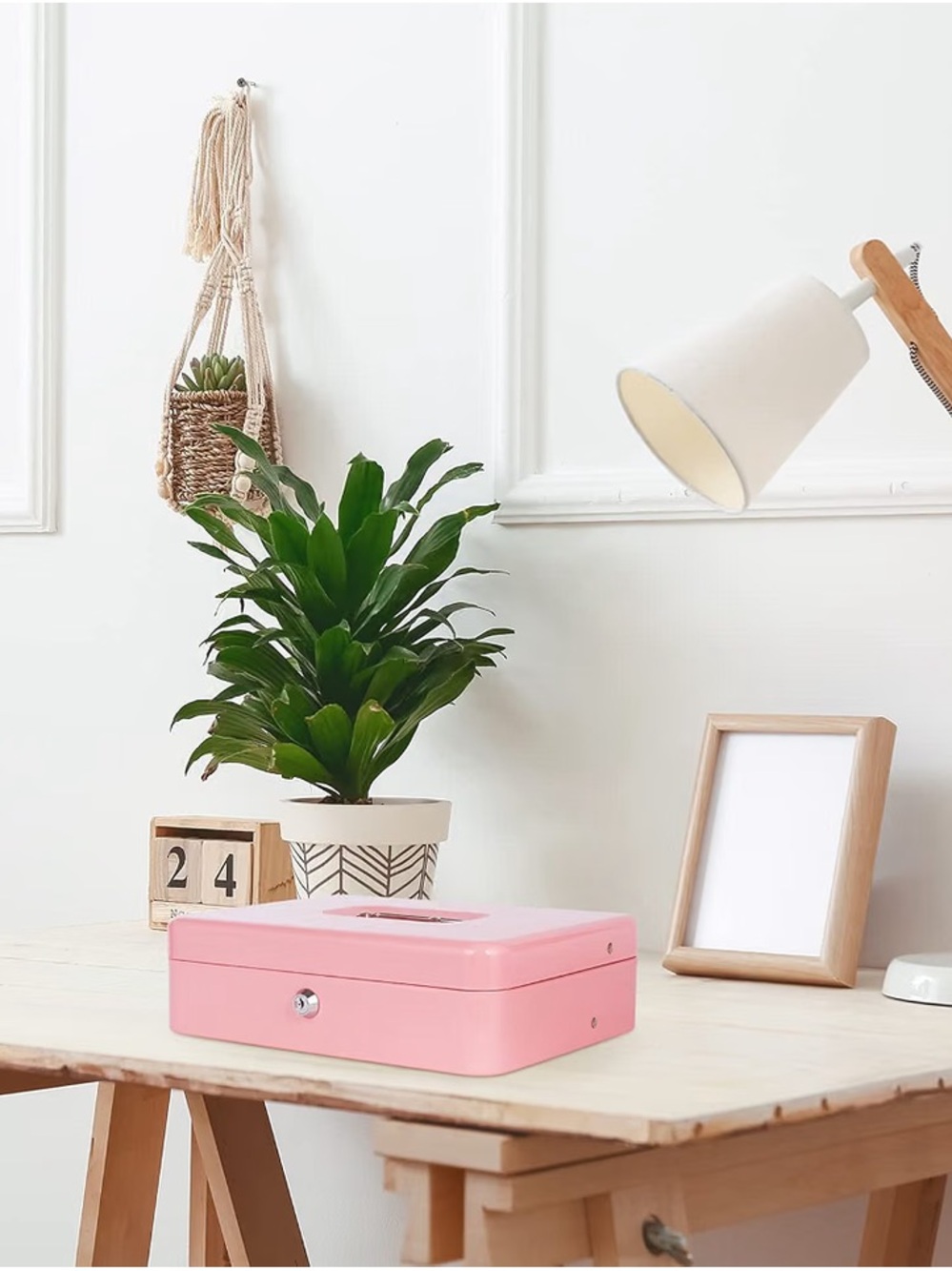 portable pink metal cash box equipped with a key lock and a flat recessed handle